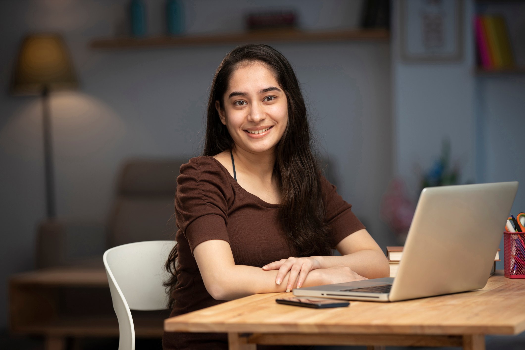 A young female student is studying english