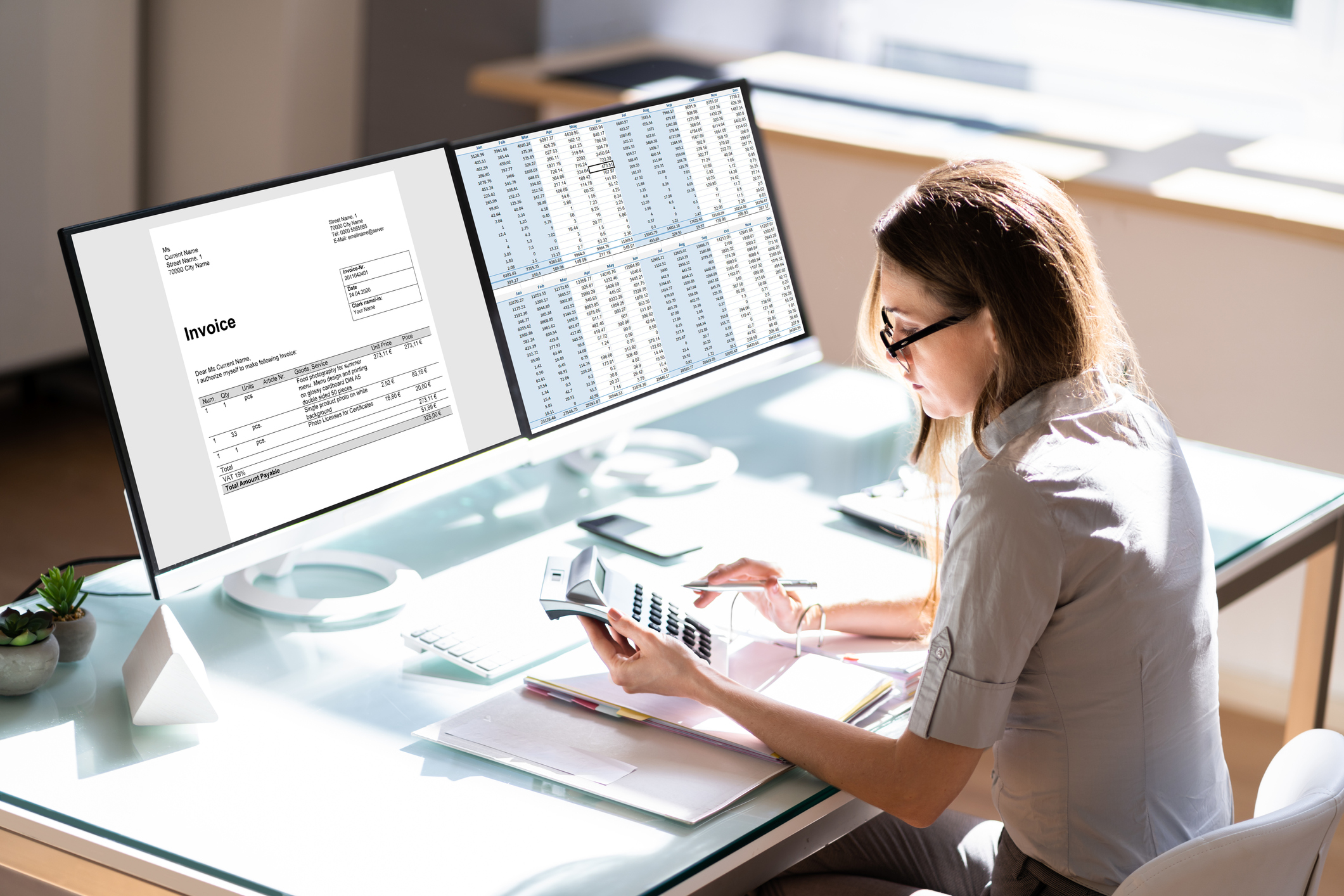 a female reconciliation clerk is working