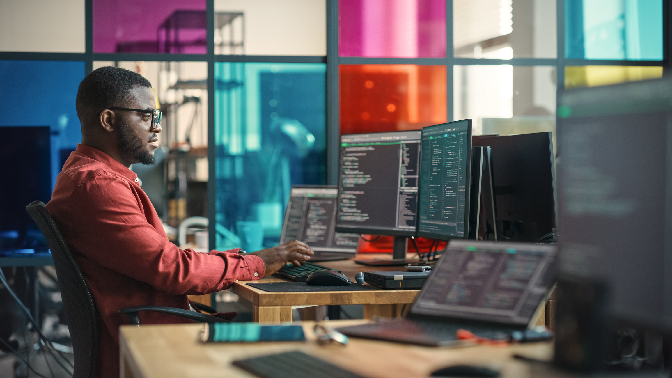 information technology professional at desk